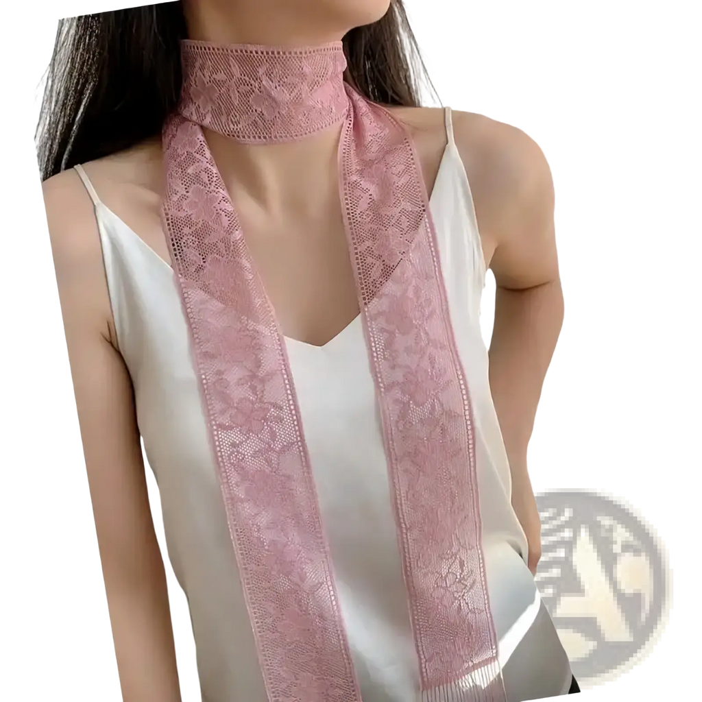 A delicate pink lace scarf floral embroidered neck wrap with a floral pattern and fringed edges