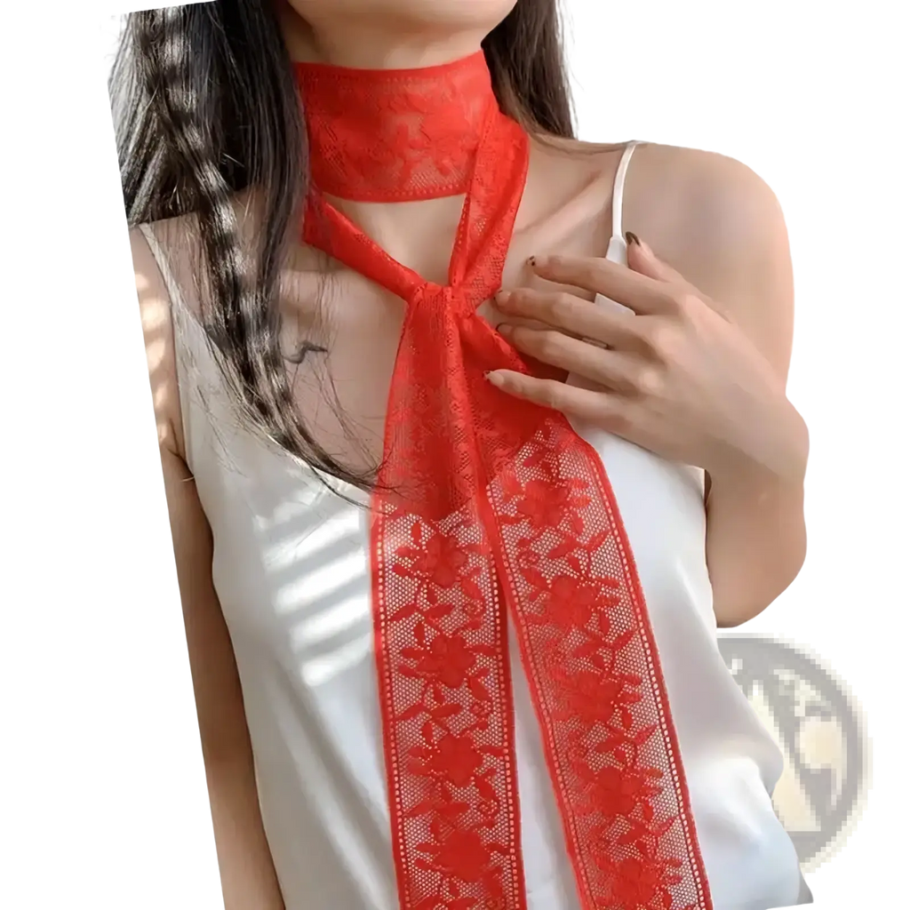A vibrant red lace scarf floral embroidered neck wrap featuring a tied front knot detail