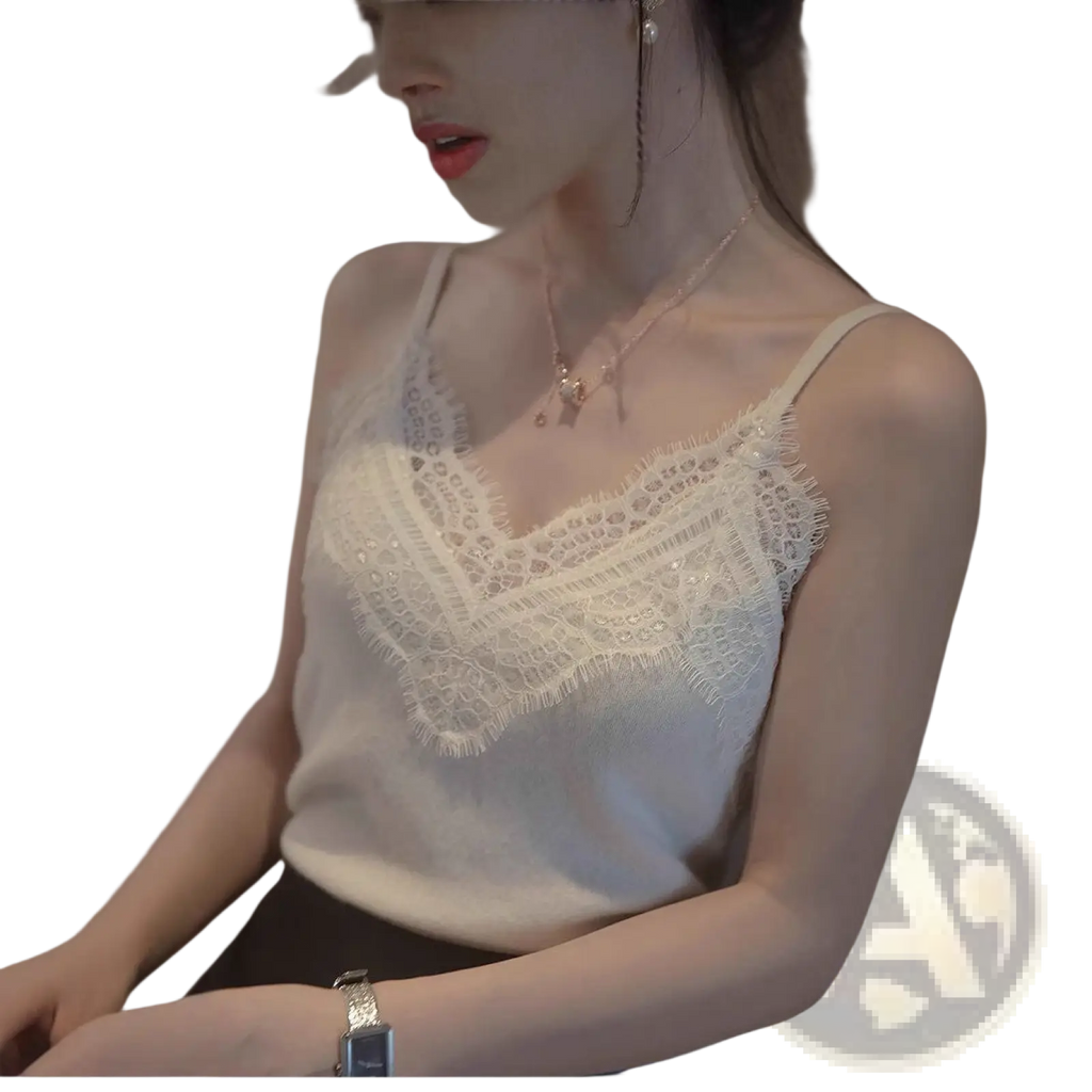 White lace trim camisole top with delicate beaded detailing and spaghetti straps in soft fabric for elegant wear