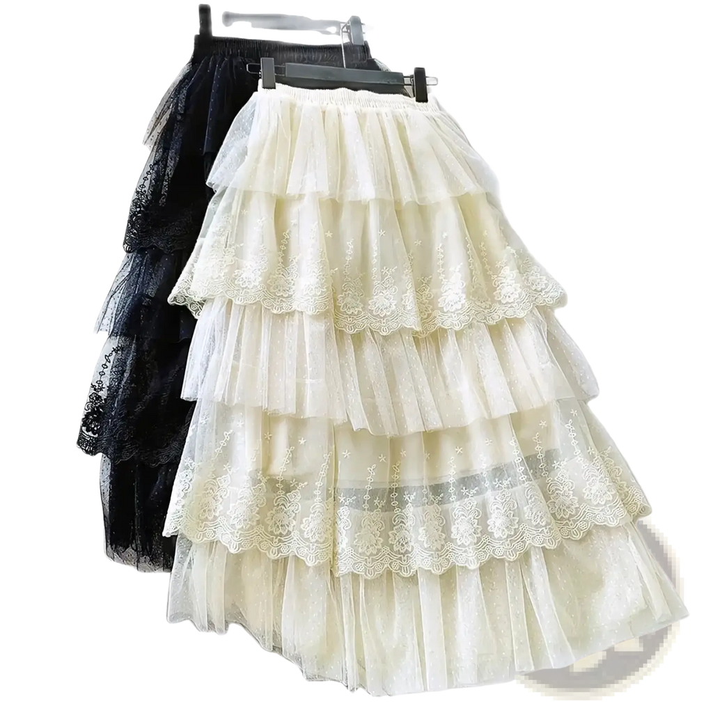 Cream-colored lace tulle skirt high waisted a line long with tiered layers and floral embroidery detailing