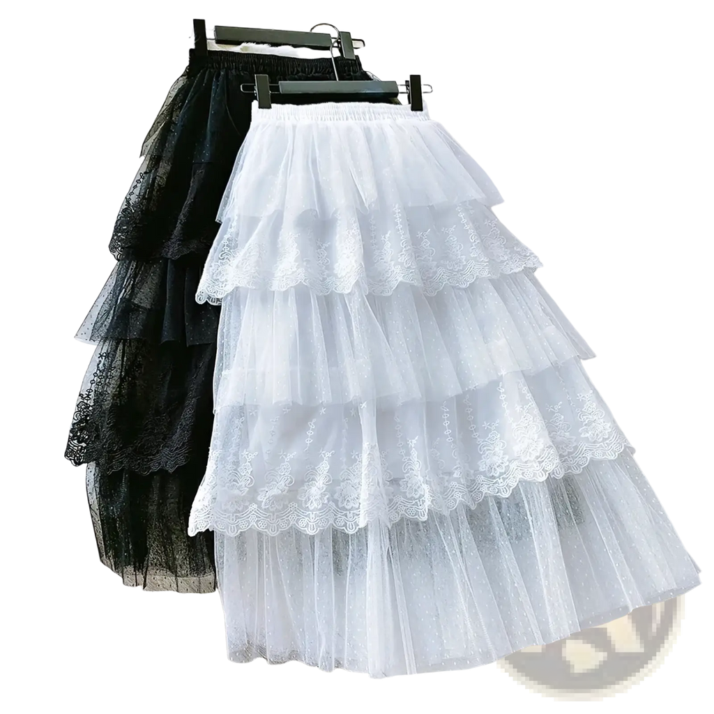 White high waisted a-line lace tulle skirt featuring tiered design and delicate lace trim for elegant wear