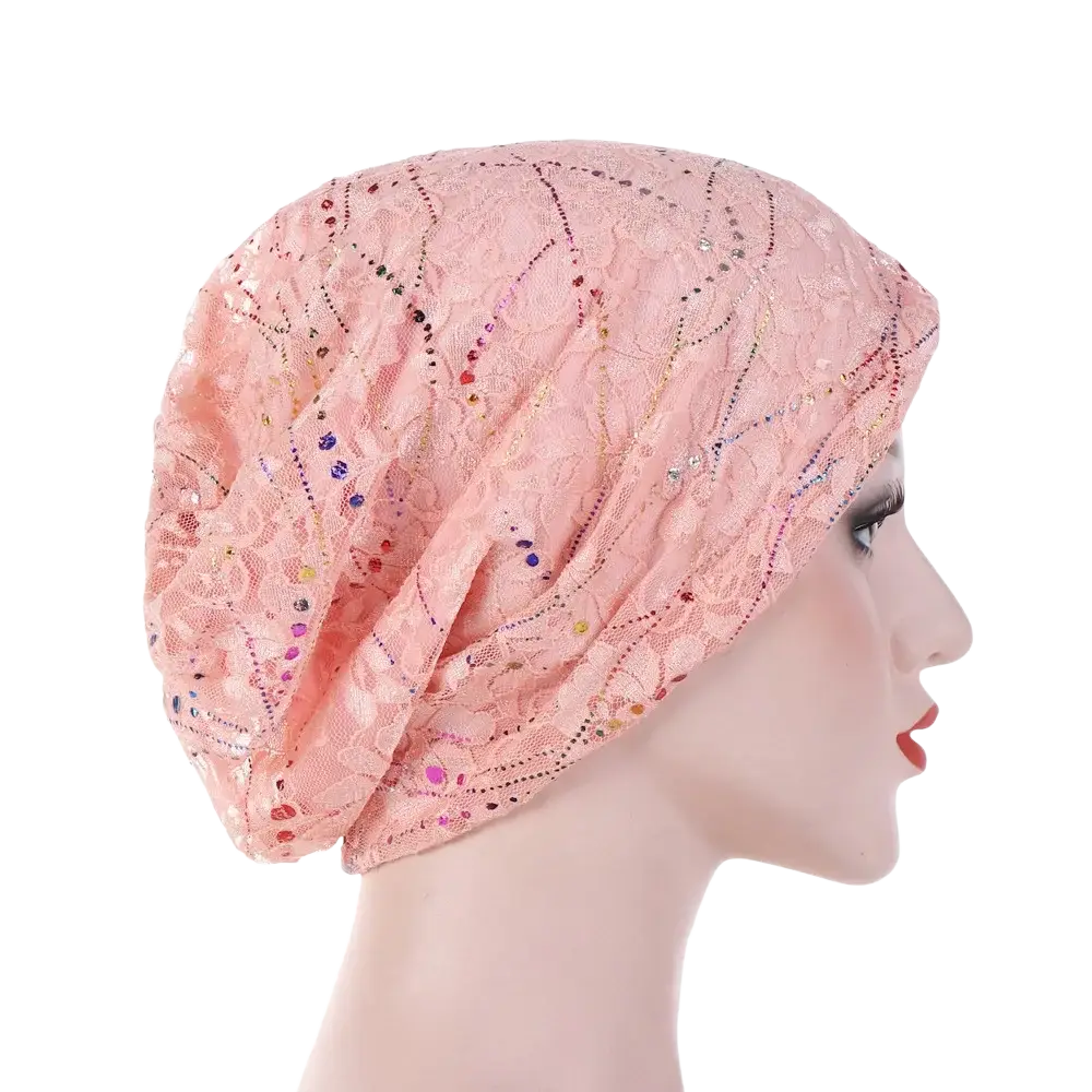 A delicate pink lace turban hijab adorned with multicolored sequins and beading for floral elastic sleep cap use