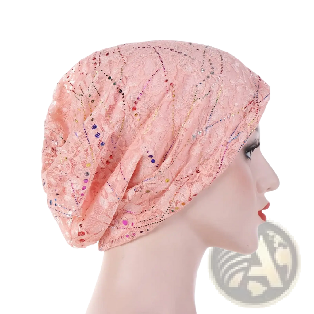 A delicate pink lace turban hijab adorned with multicolored sequins and beading for floral elastic sleep cap use