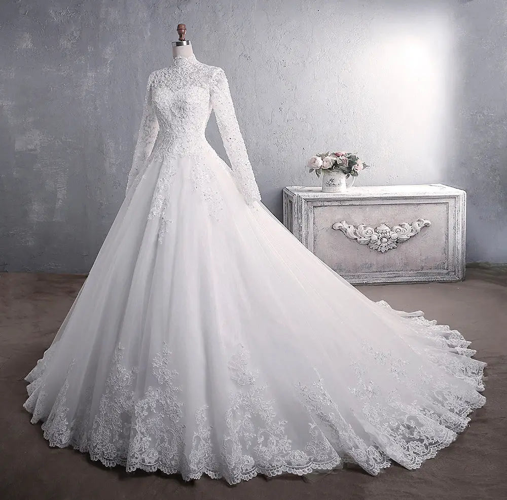 White lace embroidered stand collar wedding gown with long sleeves floral embroidery and train on bodice and skirt hem