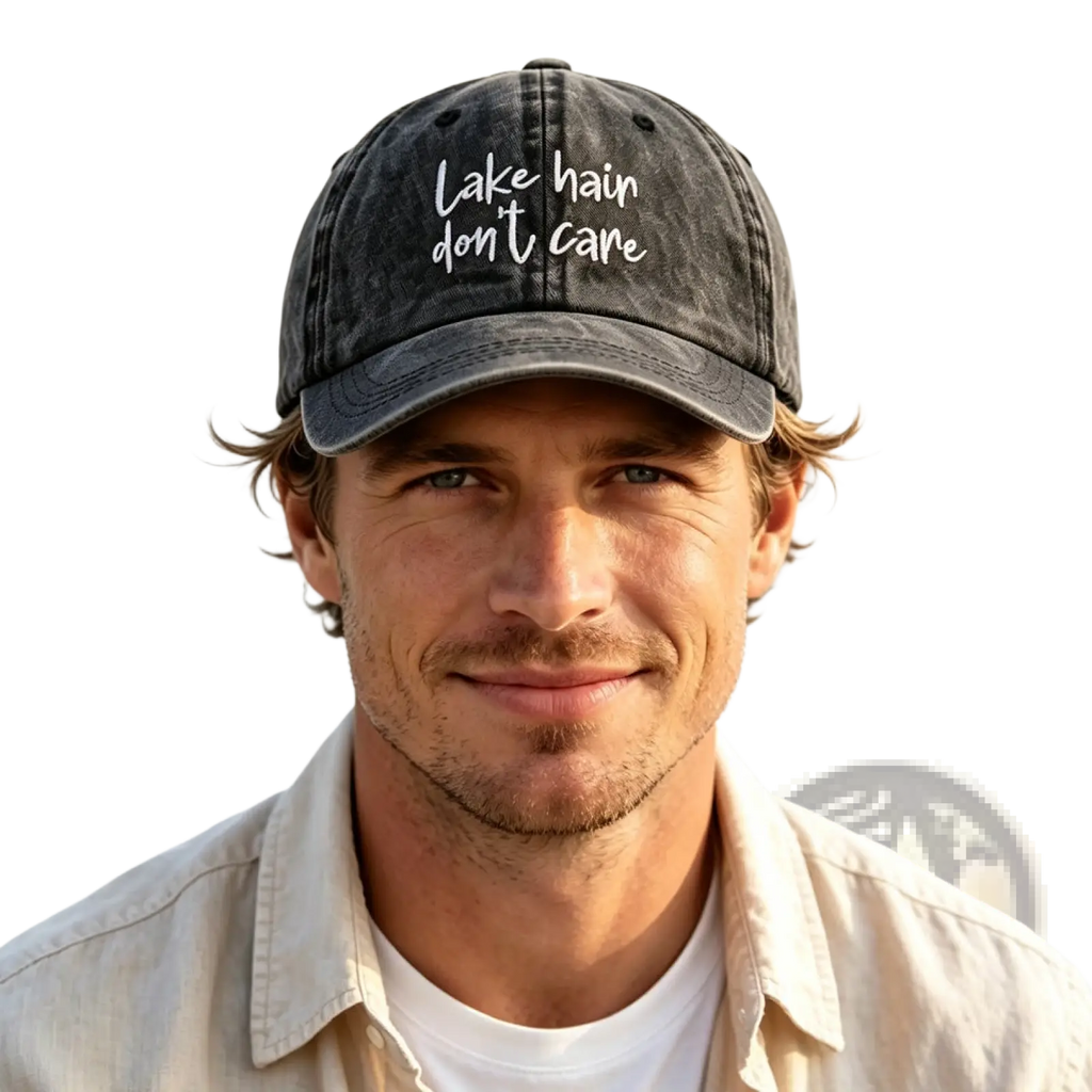 Dark gray distressed baseball cap with white embroidered lake hair don’t care text in lake hair distressed baseball cap set