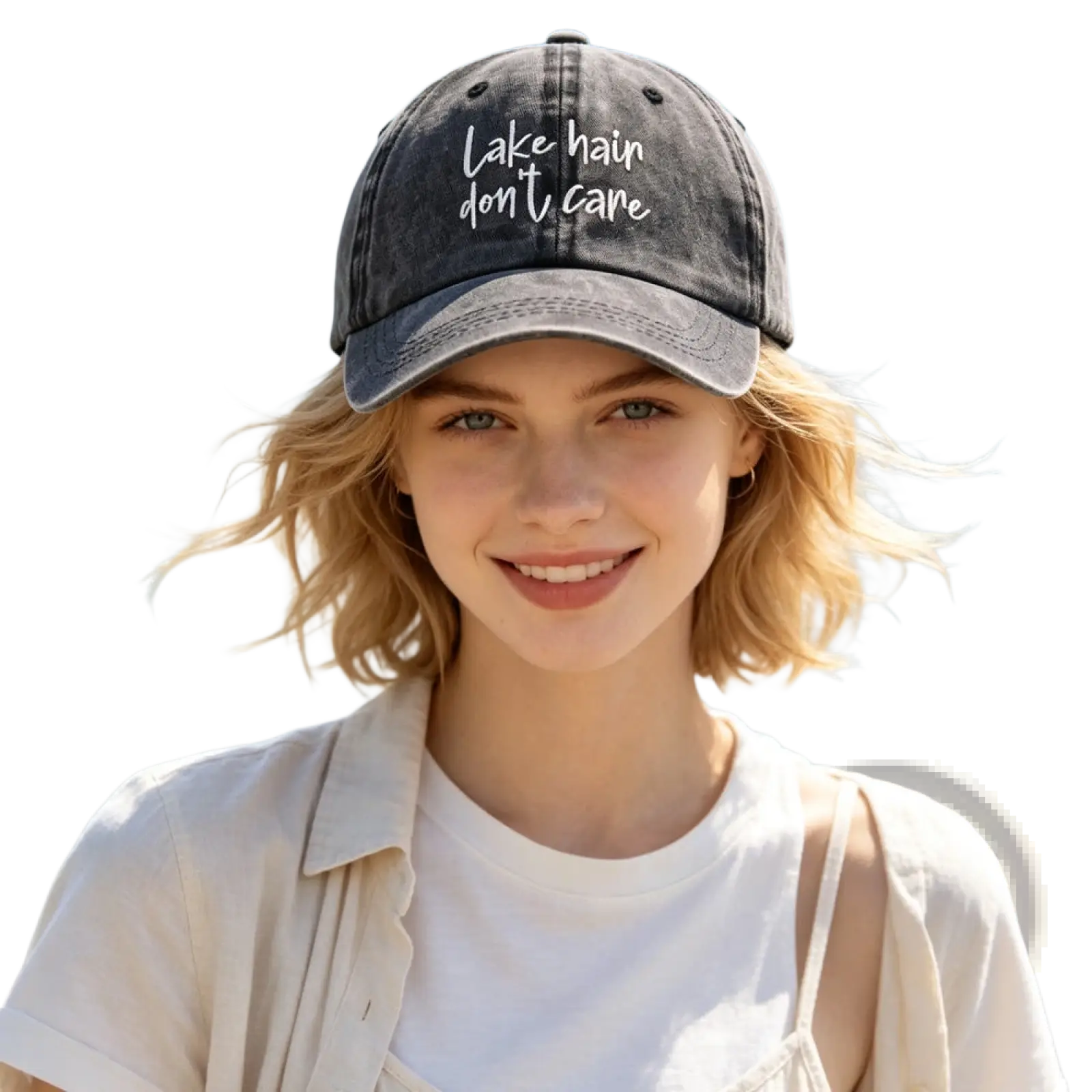 A faded black distressed baseball cap with white embroidered text lake hair don’t care for casual wear