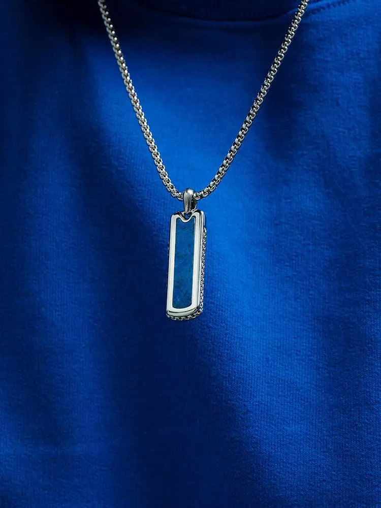 Silver rectangular dog tag necklace with deep blue lapis lazuli inlay on stainless steel chain