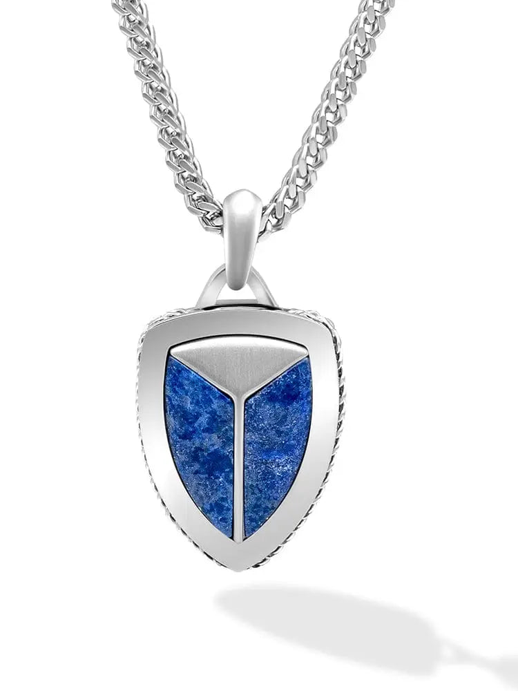 Silver shield pendant with blue lapis lazuli stone set in polished 316l stainless steel, suspended from matching chain
