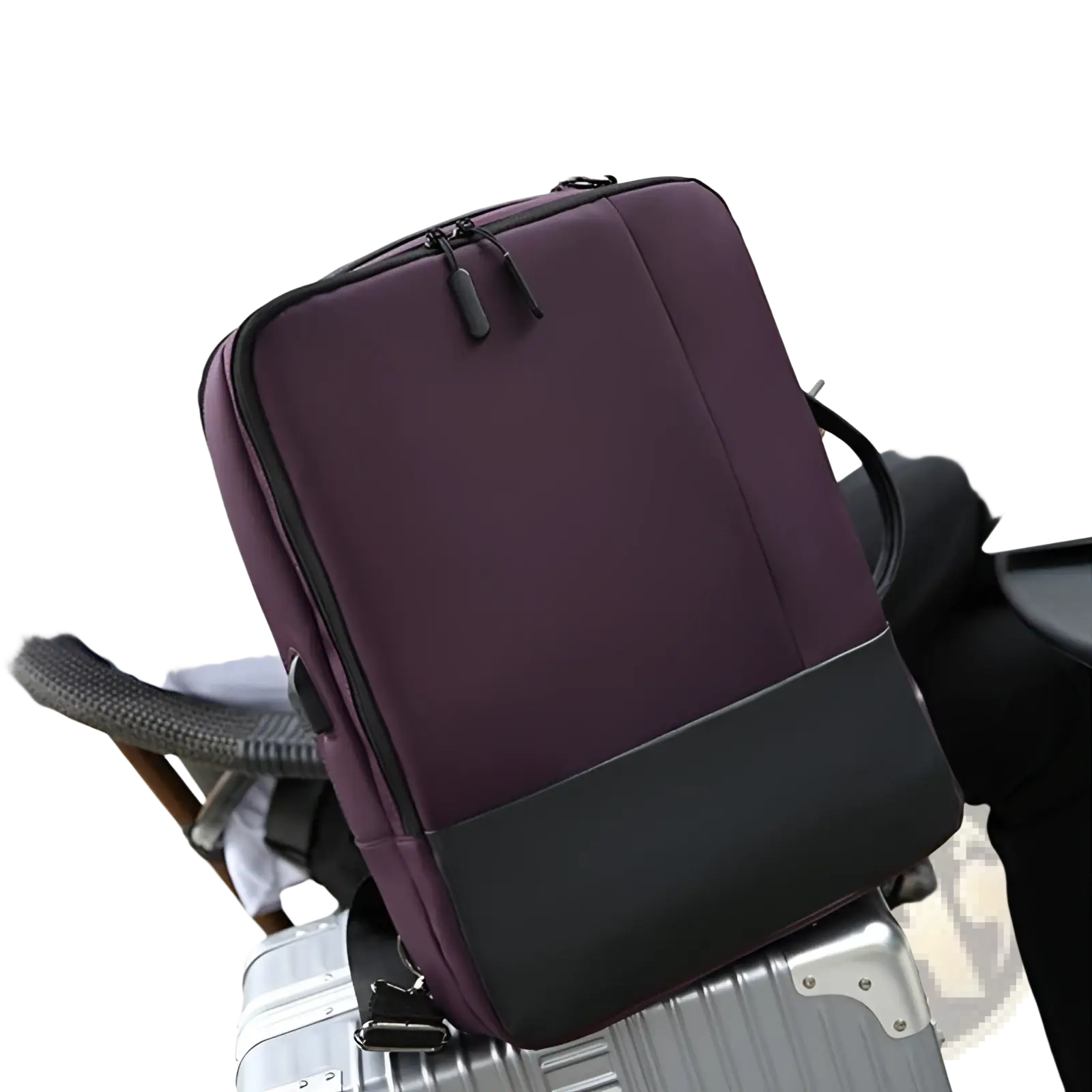 Purple and black laptop backpack made of waterproof nylon with zipper bag and sleek modern design visible from the back side