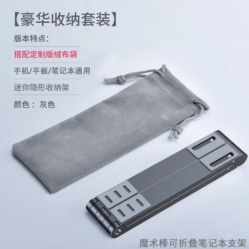 Gray metallic folding aluminum laptop stand with sleek minimalist design and two adjustable slots for mobile phone tablet use