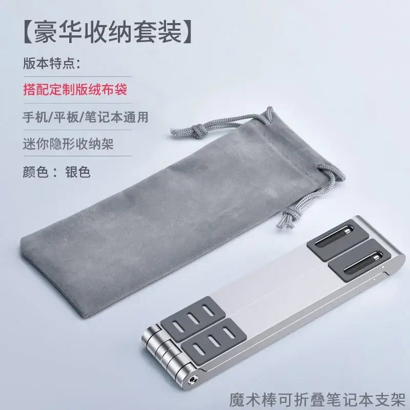 Silver metallic folding laptop stand with black rubberized grips and hinge mechanism for mobile phone tablet use