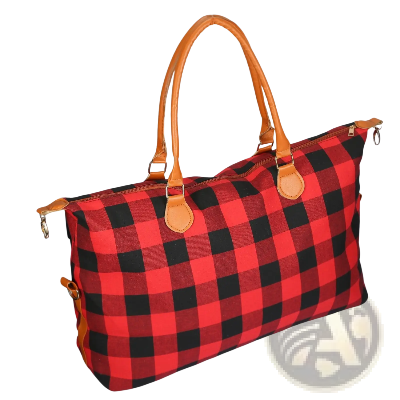 Large canvas duffle bag plaid travel tote with red and black design and tan leather handles for overnight use