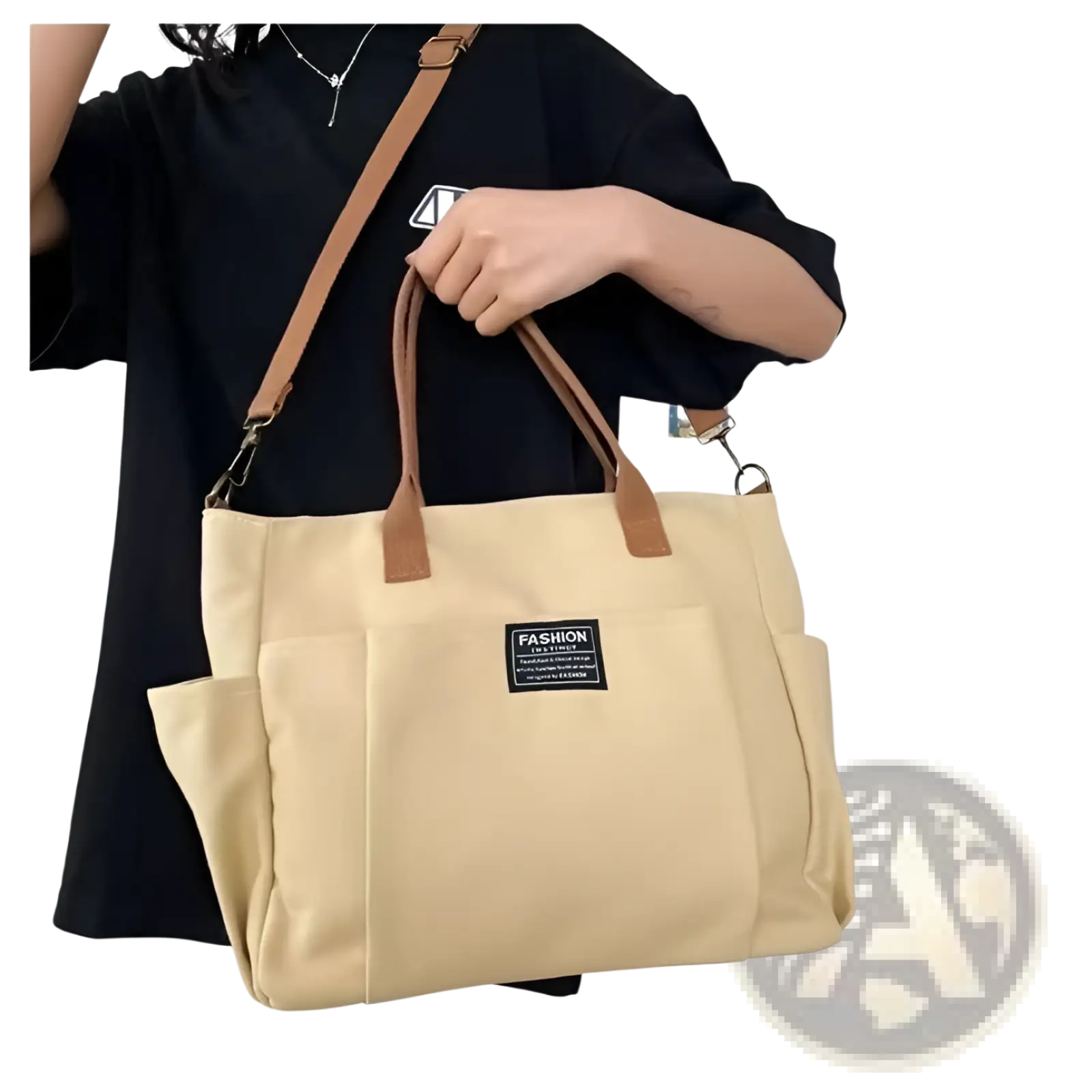 Beige large capacity canvas commuter tote with brown leather handles shoulder strap and black fashion patch on front