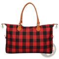 Large capacity cotton canvas weekend travel duffle bag in red and black plaid with tan leather handles