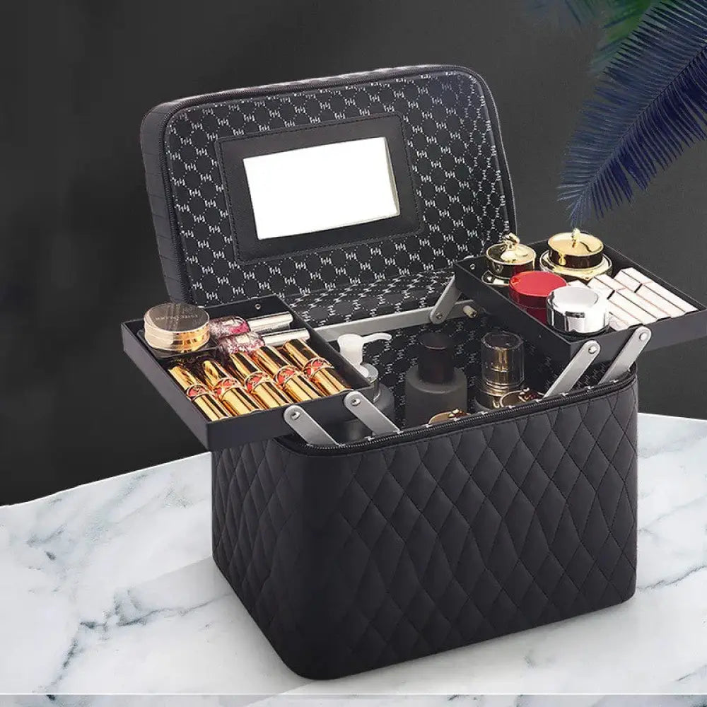 Black quilted leather Korean travel cosmetic case with built-in mirror and multiple compartments holding makeup