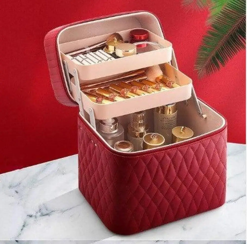 Red quilted korean travel cosmetic case with three tiered compartments and built in mirror for organized makeup storage