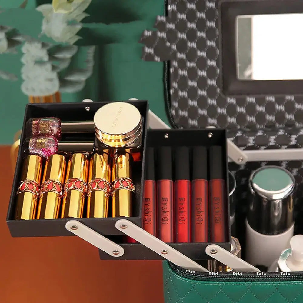 Black quilted Korean travel cosmetic case with mirror holding gold and red lipsticks compact powder and lip glosses
