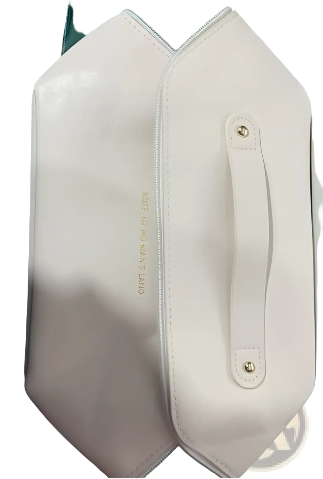 A sleek off-white leather large capacity travel makeup bag organizer with minimalist design and gold-toned hardware
