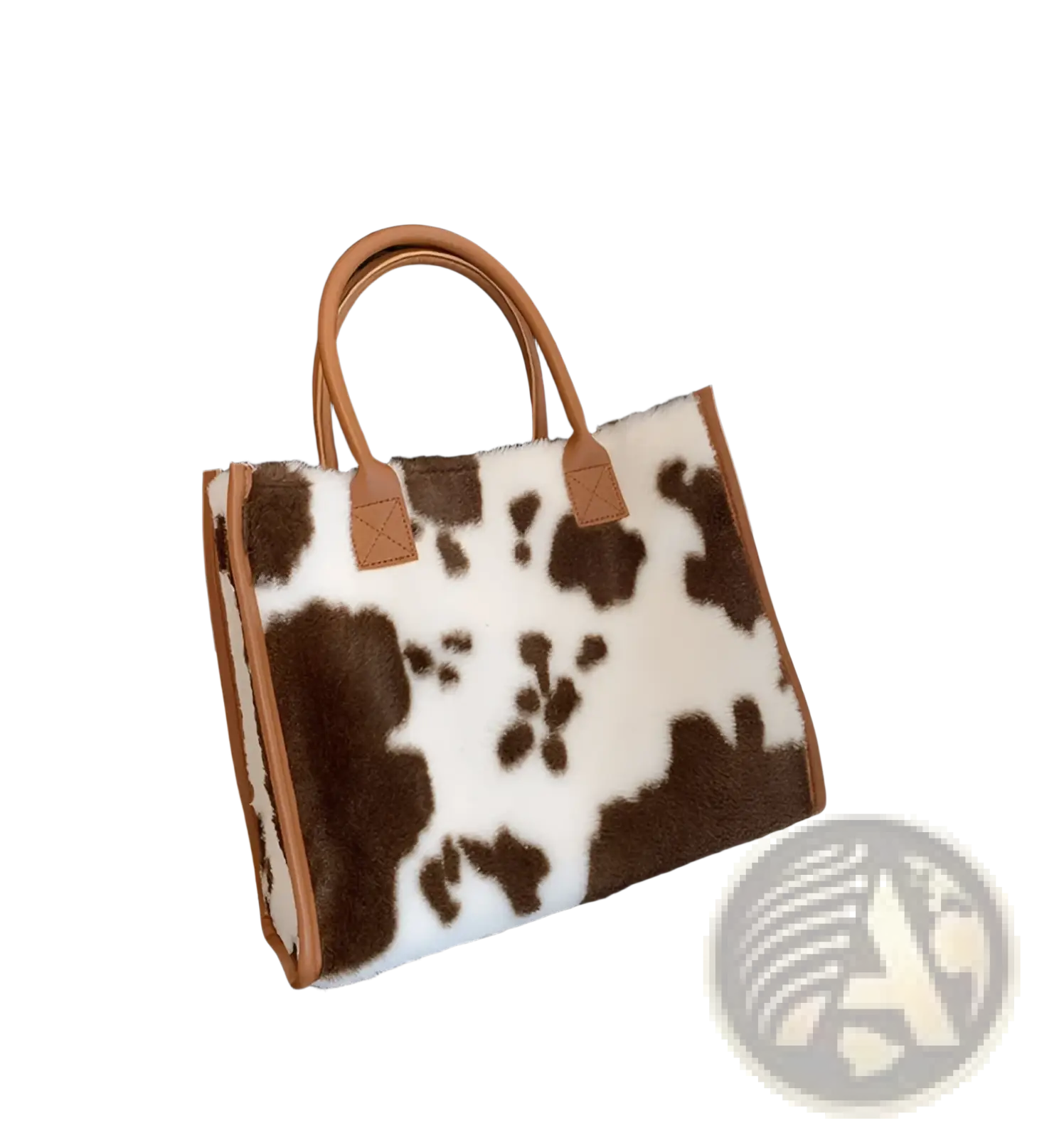 A cozy brown and white cow print faux fur tote bag with tan leather handles and trim in large capacity style
