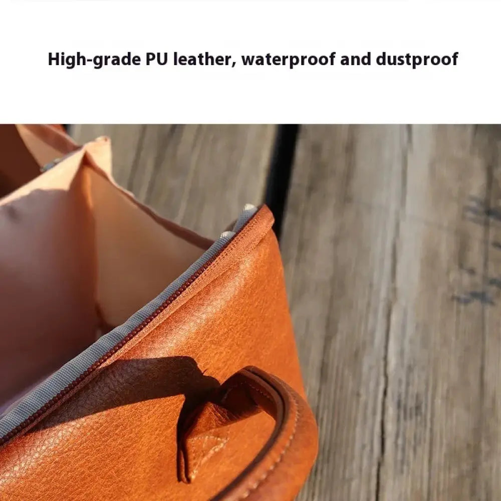 Large tan pu leather travel makeup and toiletry organizer bag with zipper closure and stitched handles