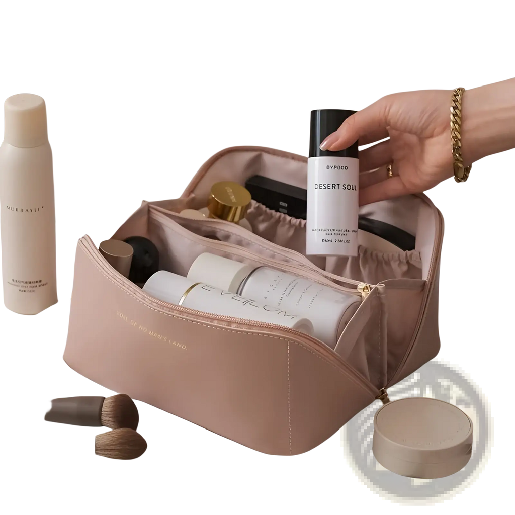 A blush pink large capacity pu leather travel makeup bag with soft texture gold zipper and subtle embossed text
