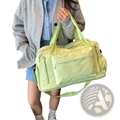 Large capacity travel duffel bag gym tote in vibrant lime green with textured fabric and matching shoulder strap