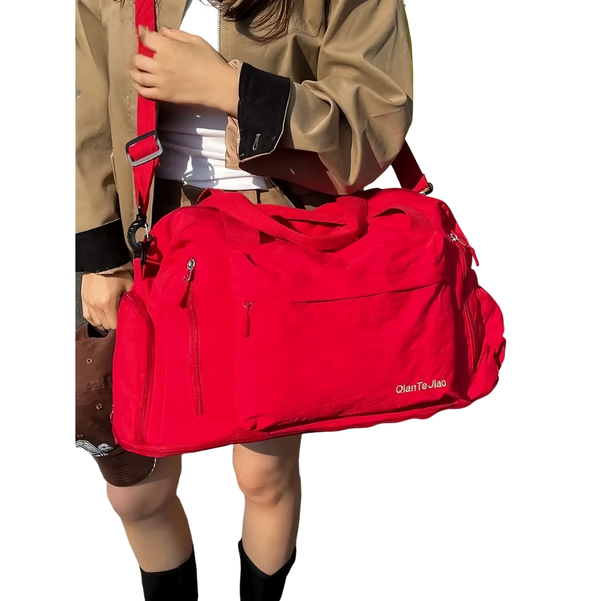 Large capacity travel duffel bag gym tote in bright red durable nylon with multiple zippers and subtle embroidered brand name