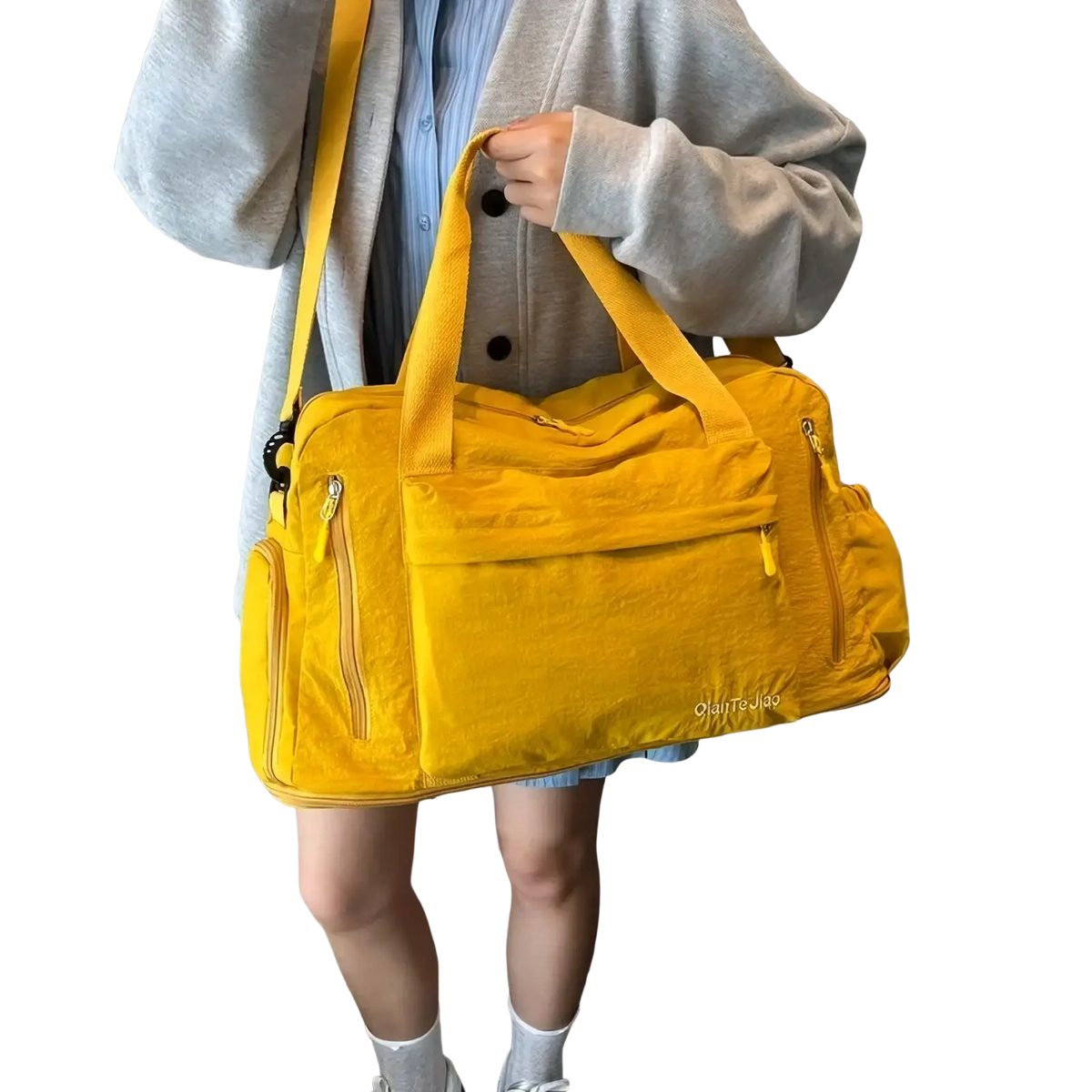 Bright yellow large capacity travel duffel bag with multiple zippers and matching shoulder strap for gym and travel use