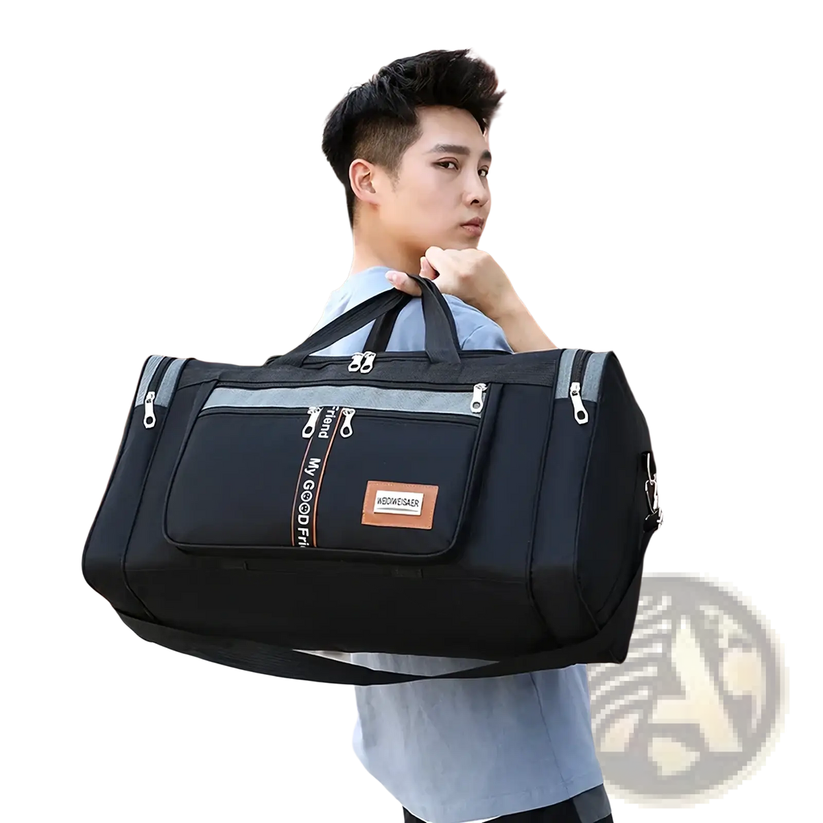 Large capacity travel duffle bag for men in black with gray accents, silver zippers, front pocket, orange-striped strap, and brown leather patch