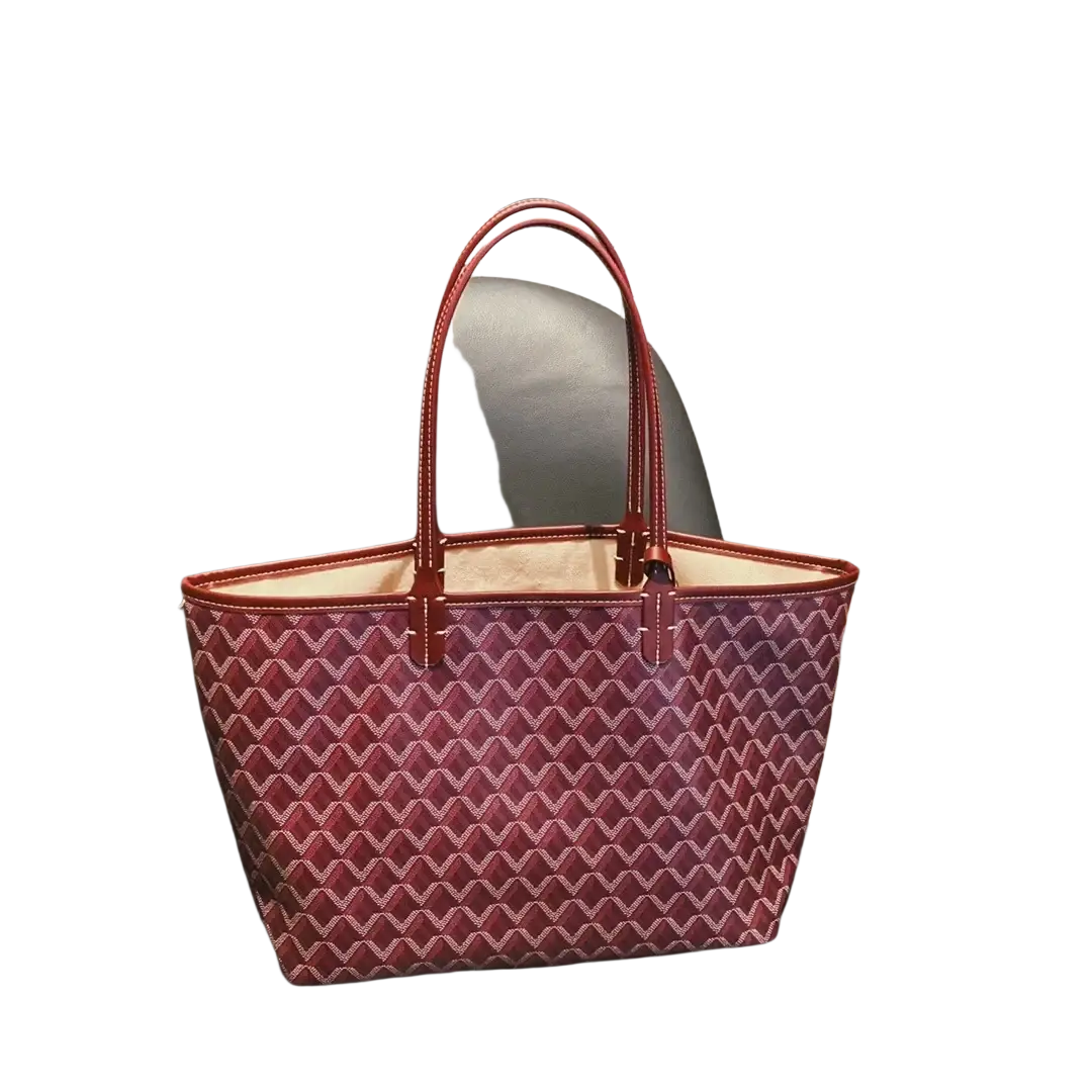 Large leather tote bag with burgundy and white geometric pattern and matching red leather handles, 1-2cm shorter design