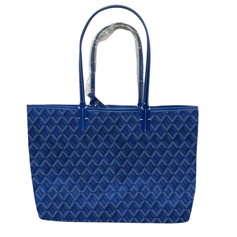 Large leather tote bag in royal blue with repeating geometric pattern and matching handles 1-2cm shorter design