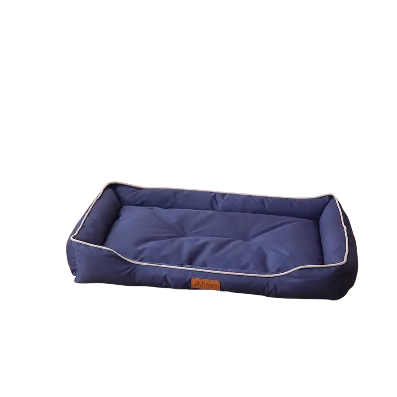 Large pink plush sofa sleeping bed for dogs with a blue rectangular pet bed featuring white piping and brown label