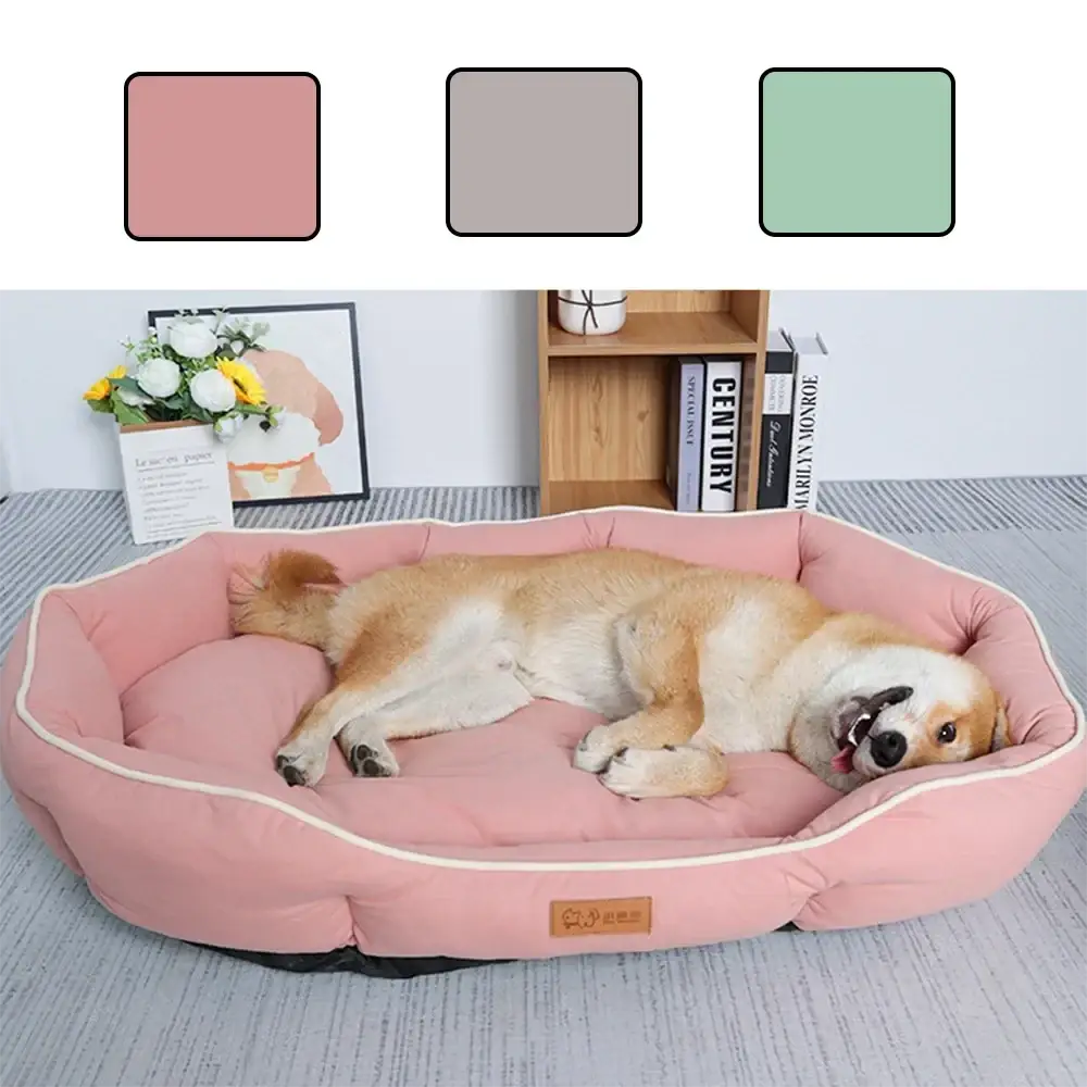 Large pink plush sofa sleeping bed for dogs with soft cushioned interior and contrasting white piping along edges