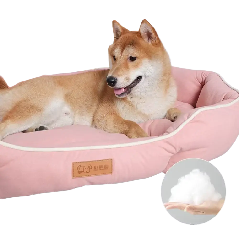 Large pink plush sofa sleeping bed for dogs with cream trim and soft fluffy interior lining