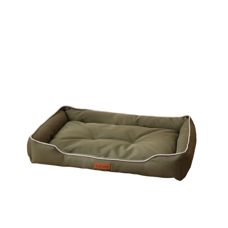 Large pink plush sofa sleeping bed for dogs with olive green rectangular pet bed and white piping detailing