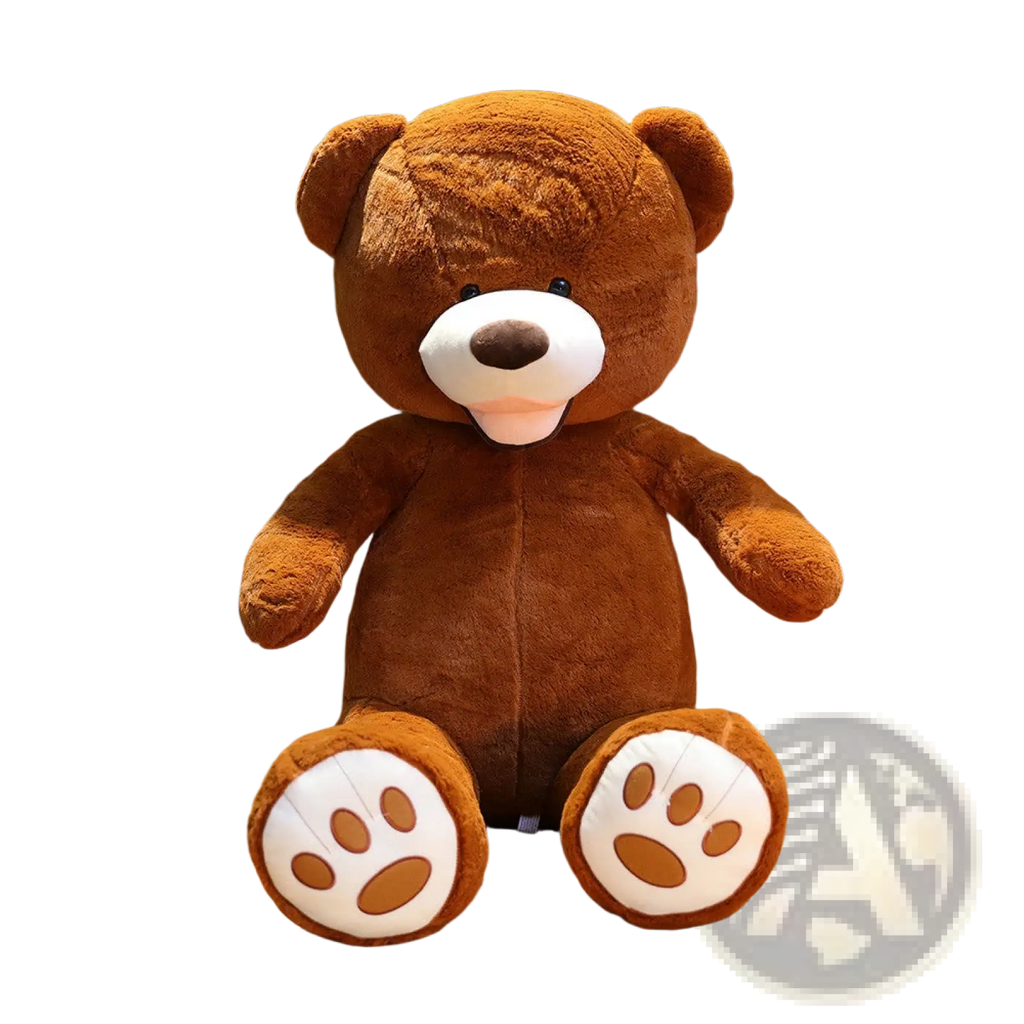 A large plush teddy bear soft velvet 1 meter in brown with white paw pads and stitched nose sitting on wooden floor