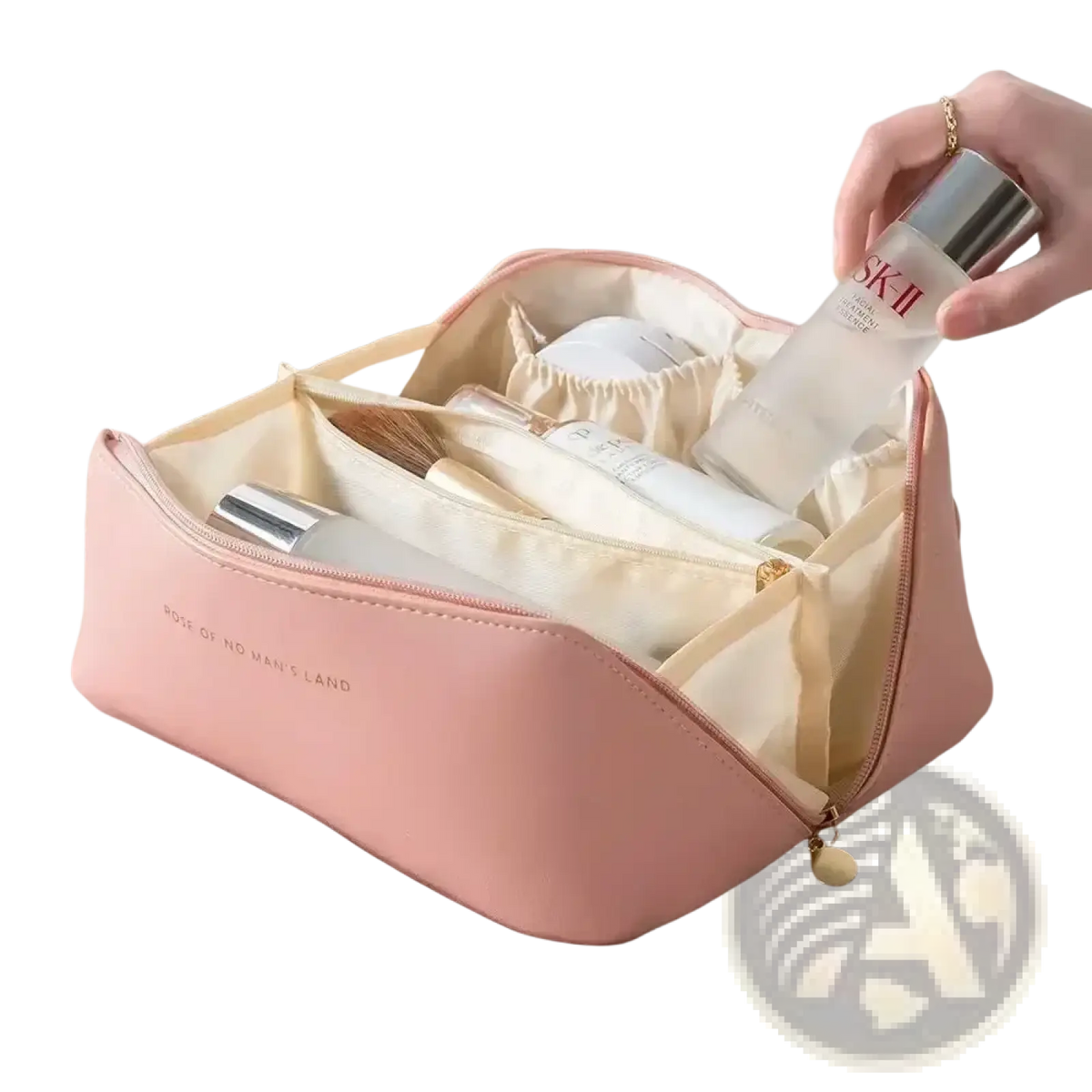 Large travel makeup bag in pink faux leather with cream interior and gold zipper pull for toiletry organization