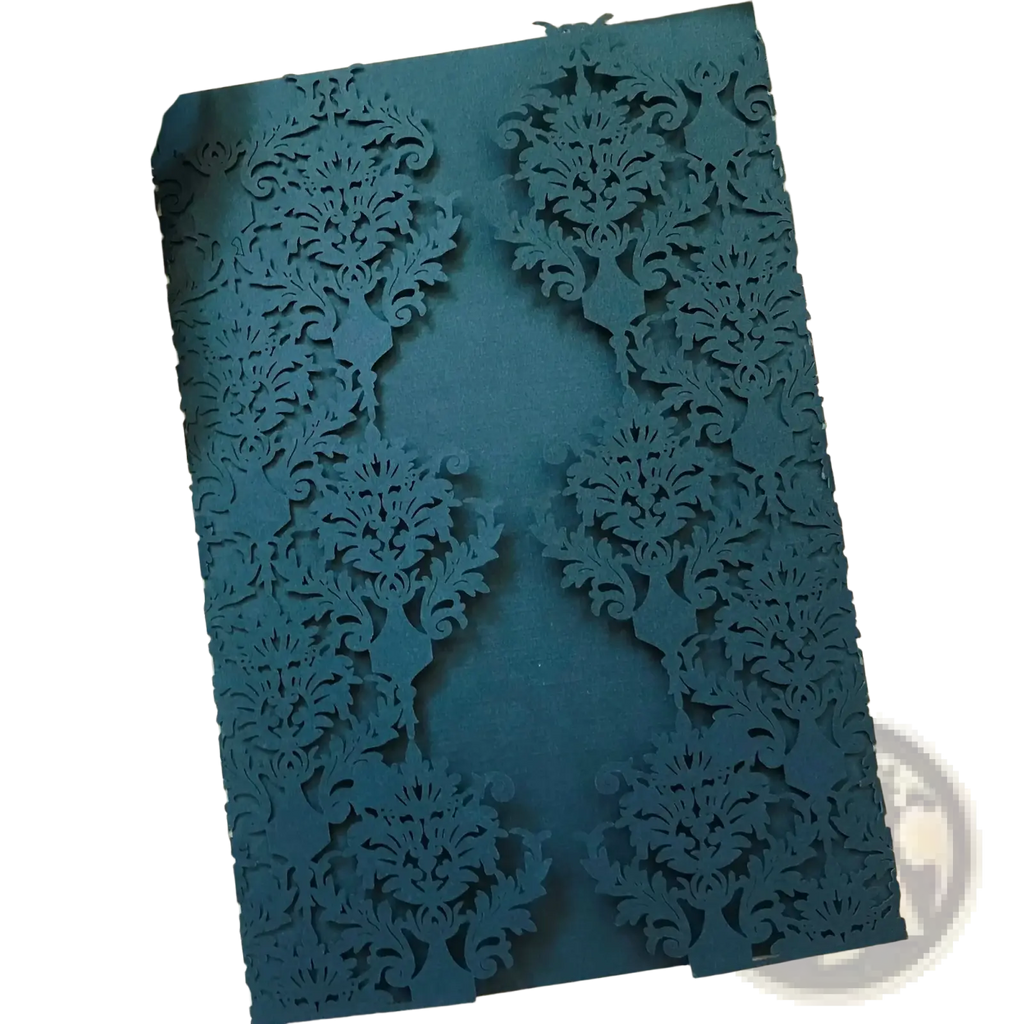 Elegant teal laser cut wedding invitation card with intricate floral and scrollwork patterns in a 10 pack set