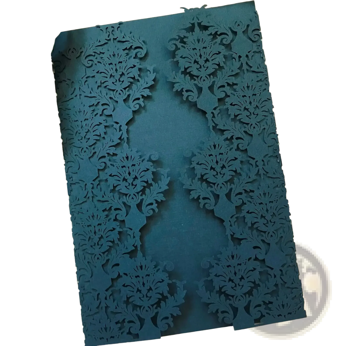 Elegant teal laser cut wedding invitation card with intricate floral and scrollwork patterns in a 10 pack set