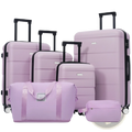 Set of lavender 6 piece hardshell luggage with spinner wheels and matching soft-sided travel bags with black trim