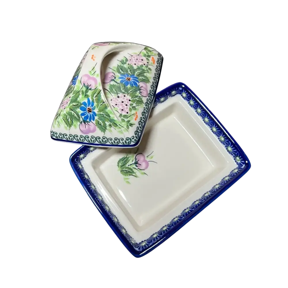 Hand-painted lavender box floral ceramic butter dish with blue and pink flowers on white background and blue border