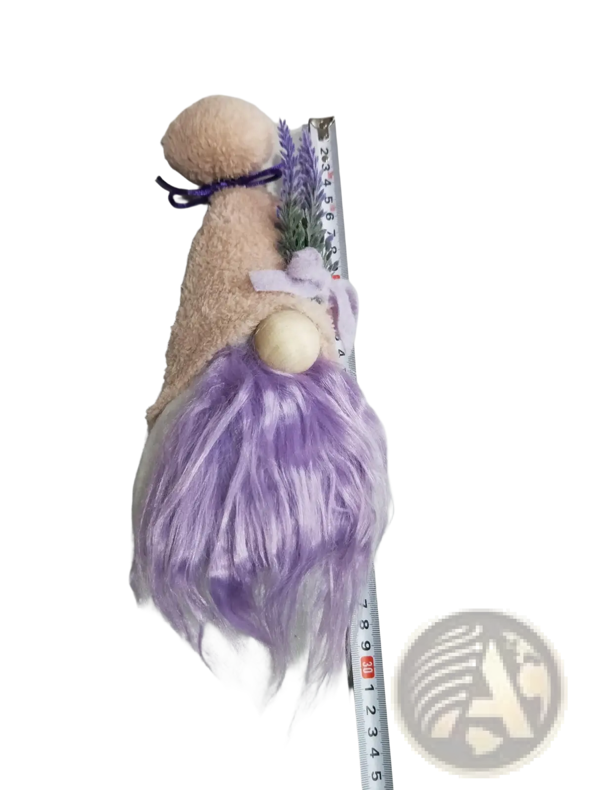 Lavender and pink plush gnome doll desktop ornament with lavender hair, beige fuzzy body, wooden nose, and purple ribbon tie