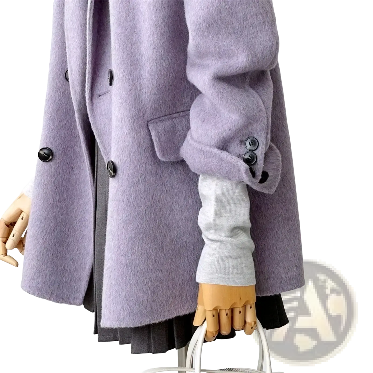 A soft lavender wool double breasted coat with black buttons and classic design perfect for cold weather