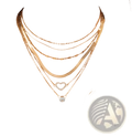 Layered gold heart and crystal pendant necklace set featuring gold-toned alloy and plated metal with crystal accents