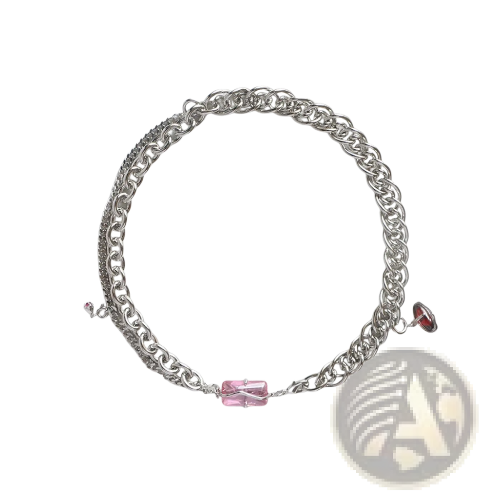 Layered silver opal and zircon necklace with pink and red crystal charm details in a stylish layered design