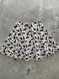 Le Chat Parisian cat print cotton skater skirt in white with black cats holding american flags and colorful balloons