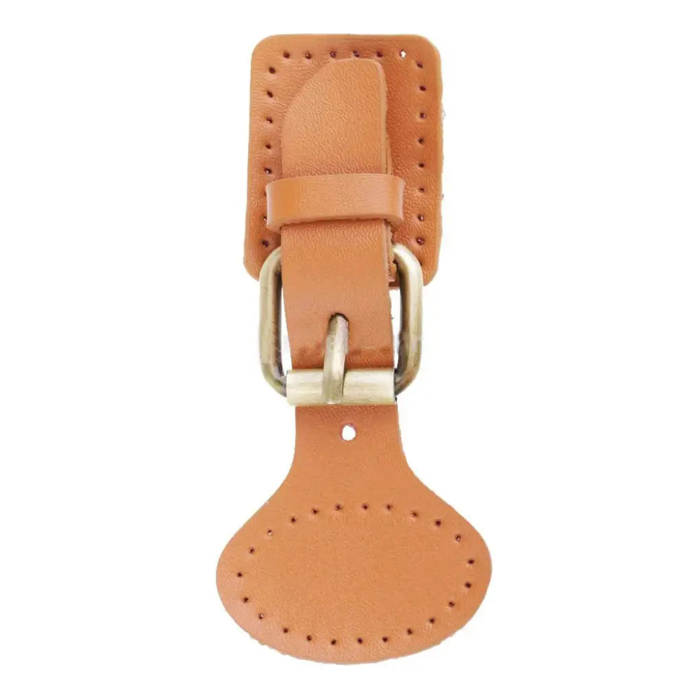 Handcrafted oval leather hook fastener with tan leather strap, perforated detailing, and silver-toned metal buckle