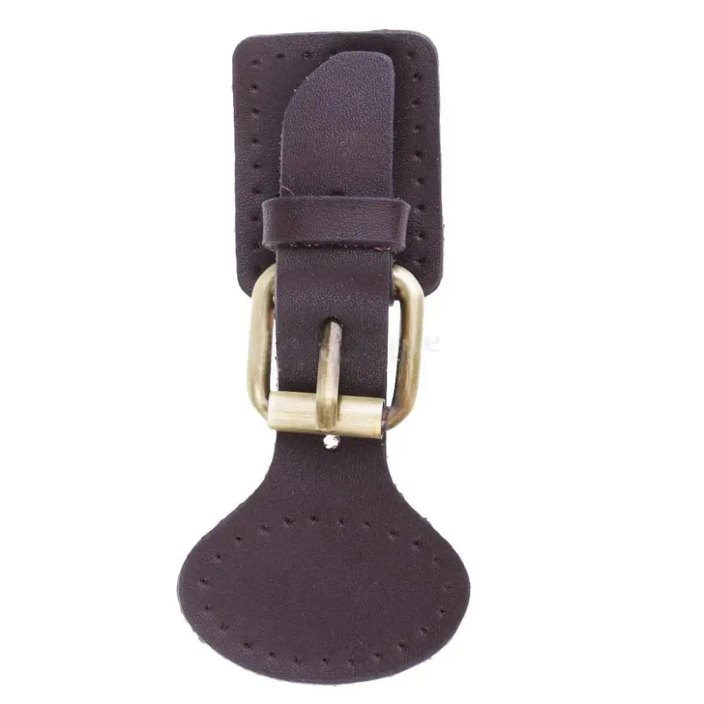Dark brown handcrafted oval leather hook fastener with perforated strap and brass buckle hardware