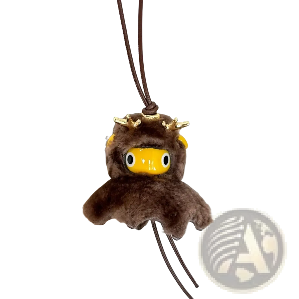 Brown plush deer-shaped leather animal bag charm keychain with golden antlers and bright yellow face