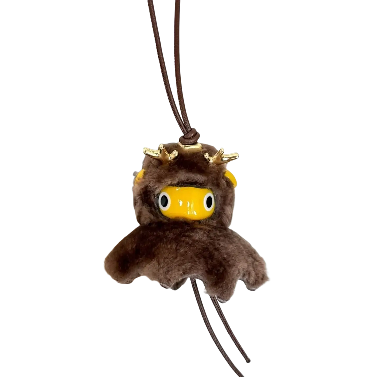 Brown leather plush reindeer keychain with gold antlers and yellow face as a cute designer bag charm accessory